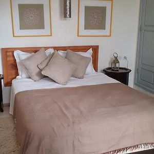 Kamer met een Queen Size Bed